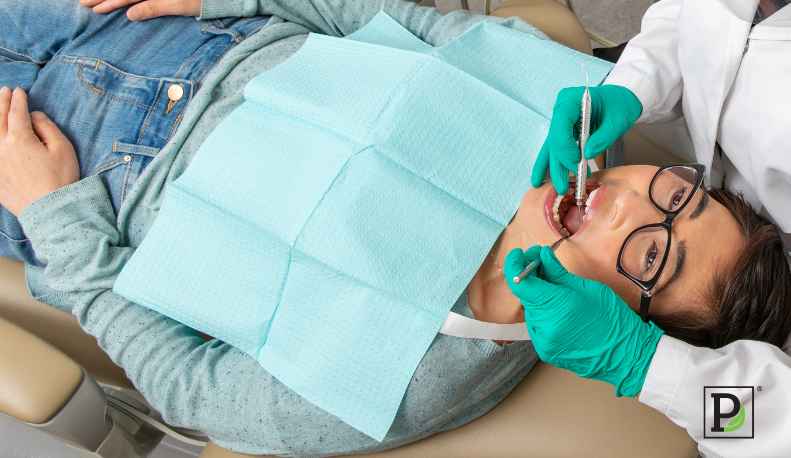 Patient having their dental exam done.